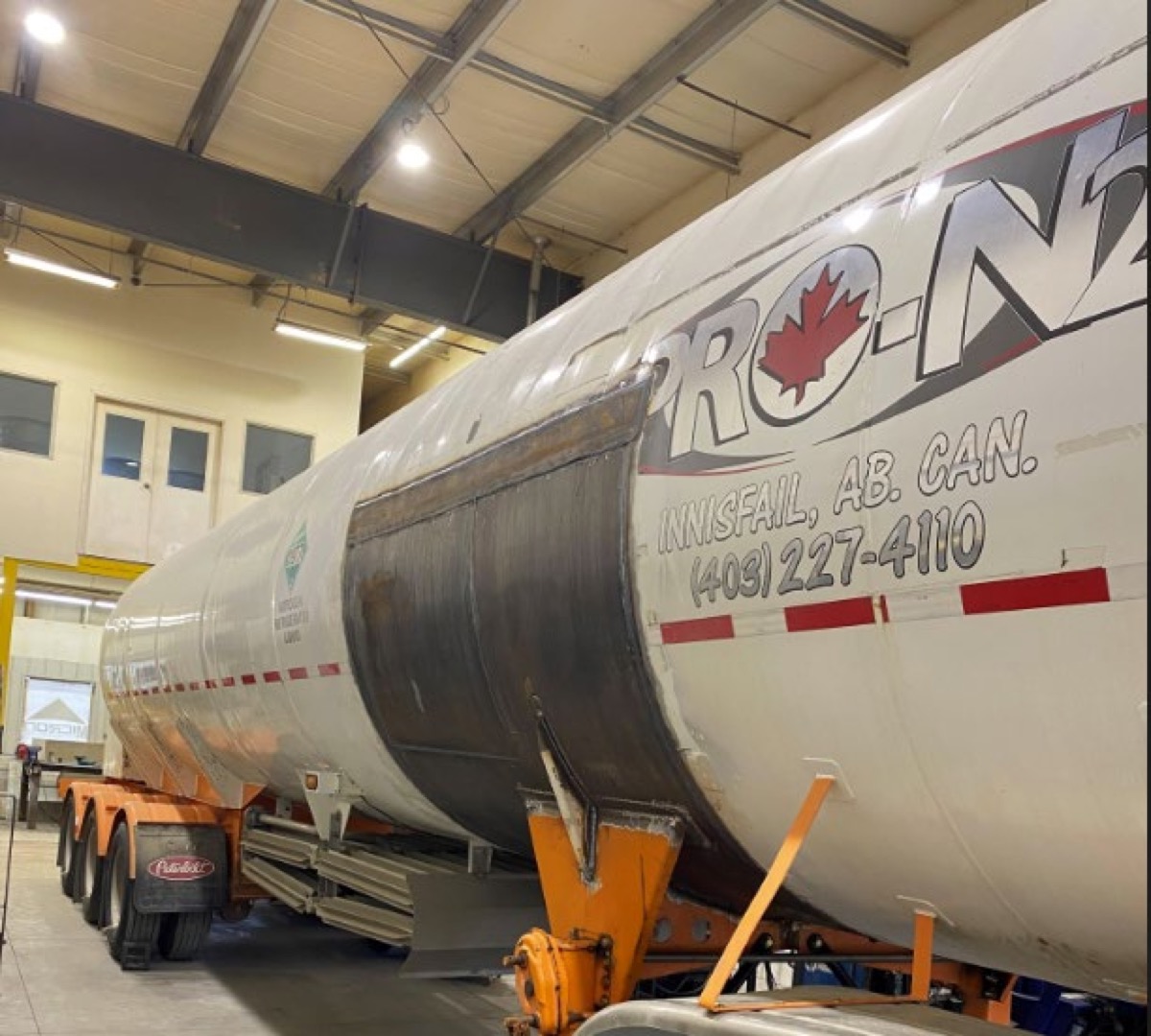 Cryogenic tank trailer undergoing shop repairs